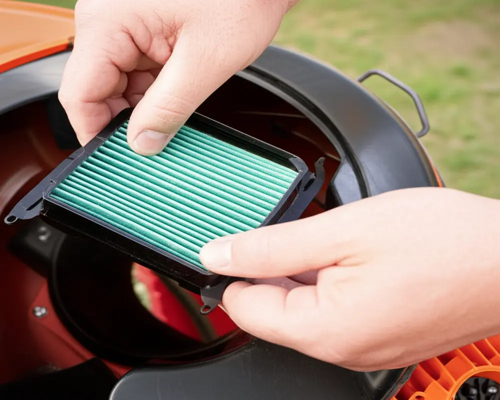 Proper replacement of a leaf blower air filter showing correct seating